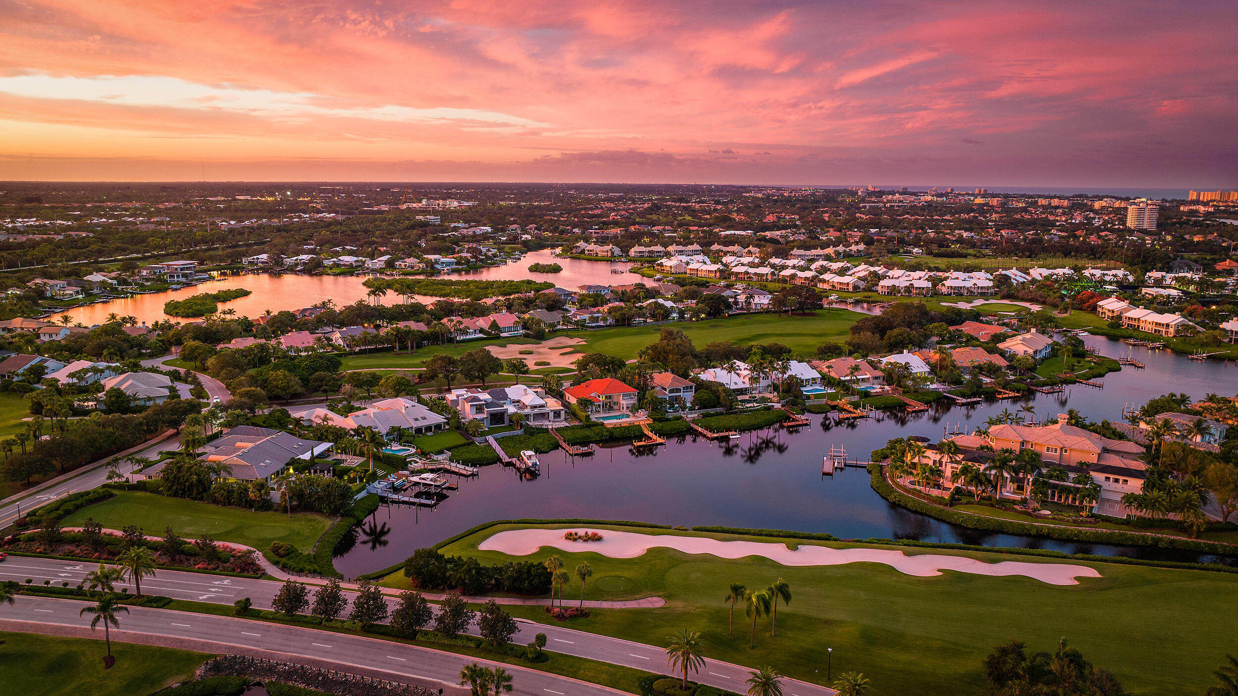 134 Golf Village Boulevard Jupiter, FL 33458 - Photo 32 of 48 an aerial view of residential houses with outdoor space