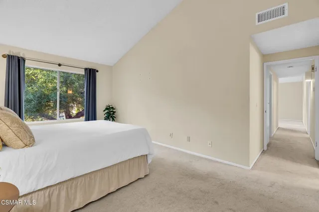 a view of a chairs and table in patio