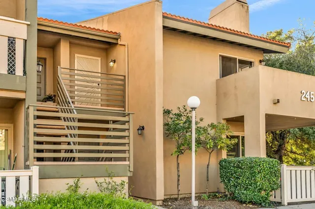 a view of a street with an outdoor space