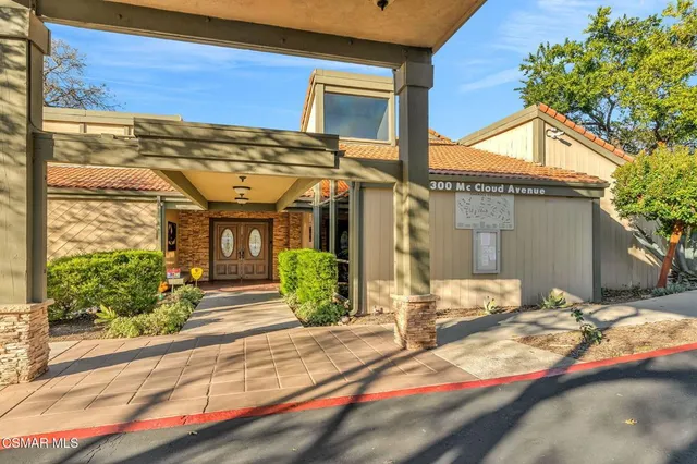 a view of swimming pool with outdoor seating and yard