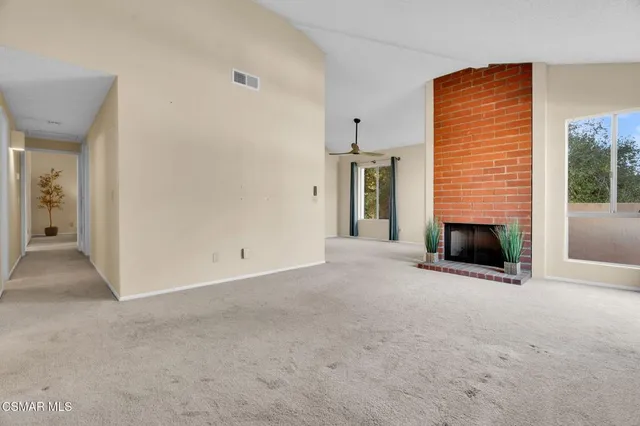 a view of a livingroom with a fireplace