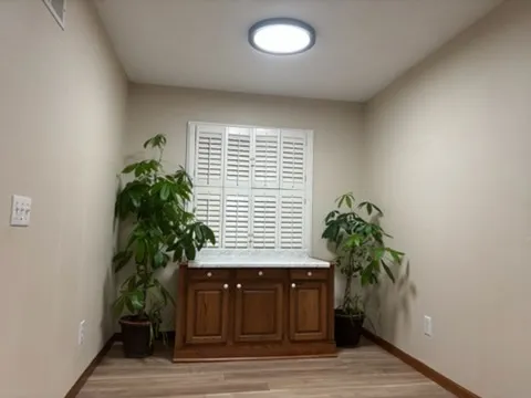 a bedroom with a bed and a fireplace