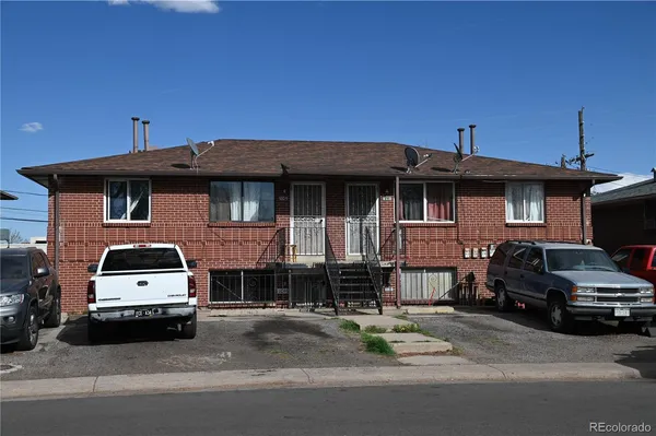 a car parked in front of a house