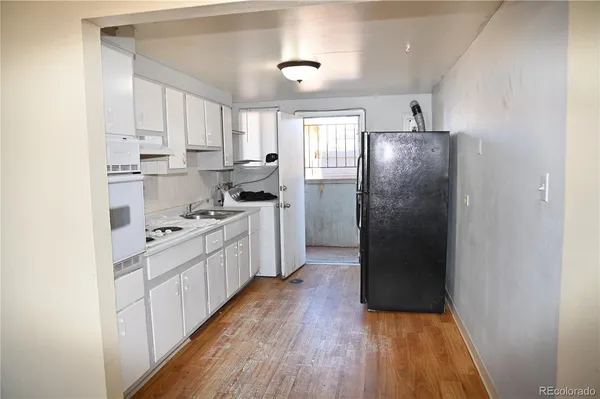 a picture of a bathroom with a sink and a mirror