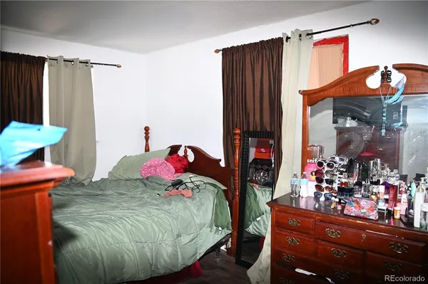 a view of street with parked cars