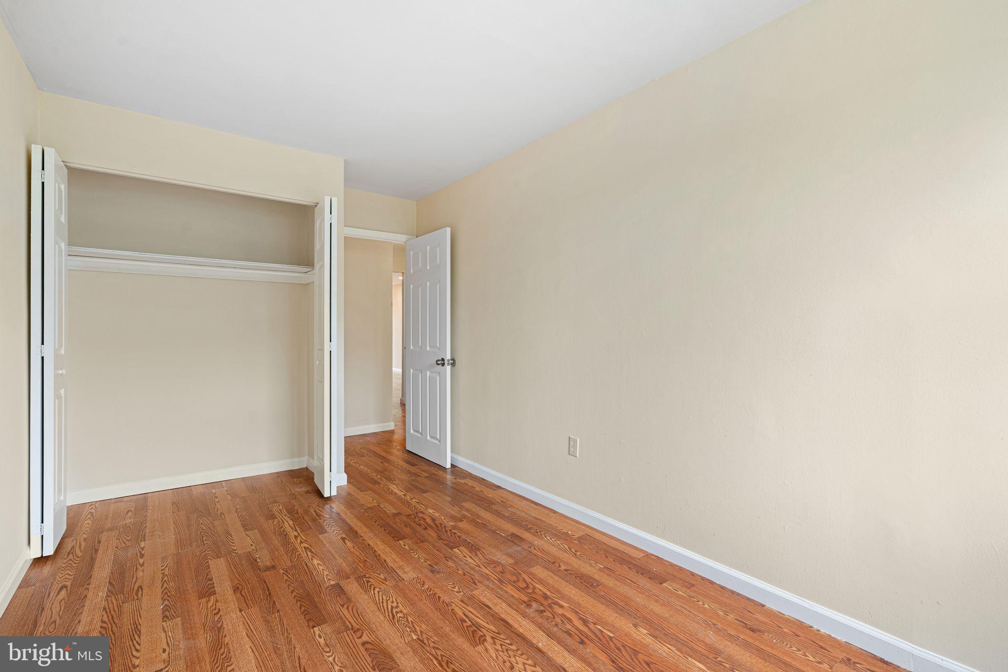 3281 Red Lion Road, Unit 2 Philadelphia, PA 19114 - Photo 11 of 15 Spacious room with warm wood floors.