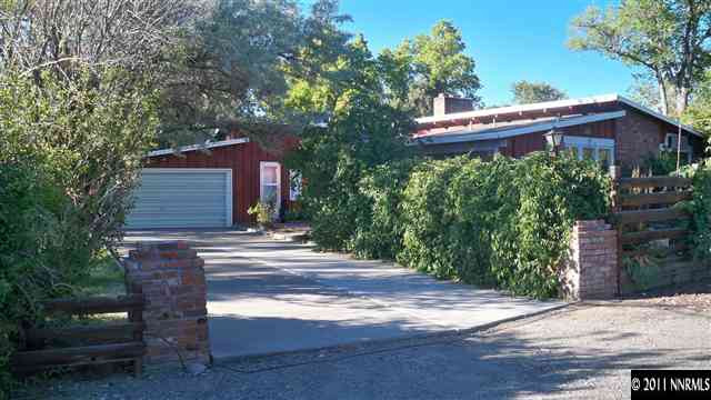 45 Suda Way Reno, NV 89509 - Photo 2 of 13 a pathway of a house with a yard
