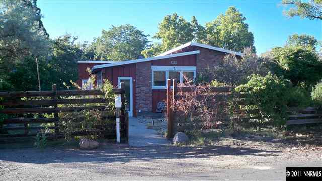 45 Suda Way Reno, NV 89509 - Photo 3 of 13 a view of a house with a yard