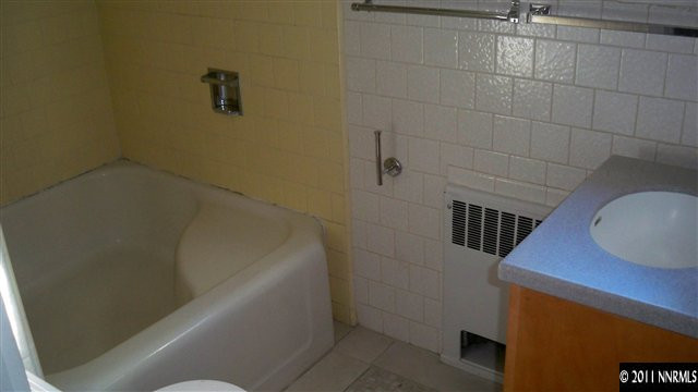 45 Suda Way Reno, NV 89509 - Photo 10 of 13 a bathroom with a sink and mirror
