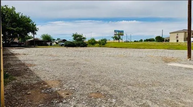 a view of a playground with houses