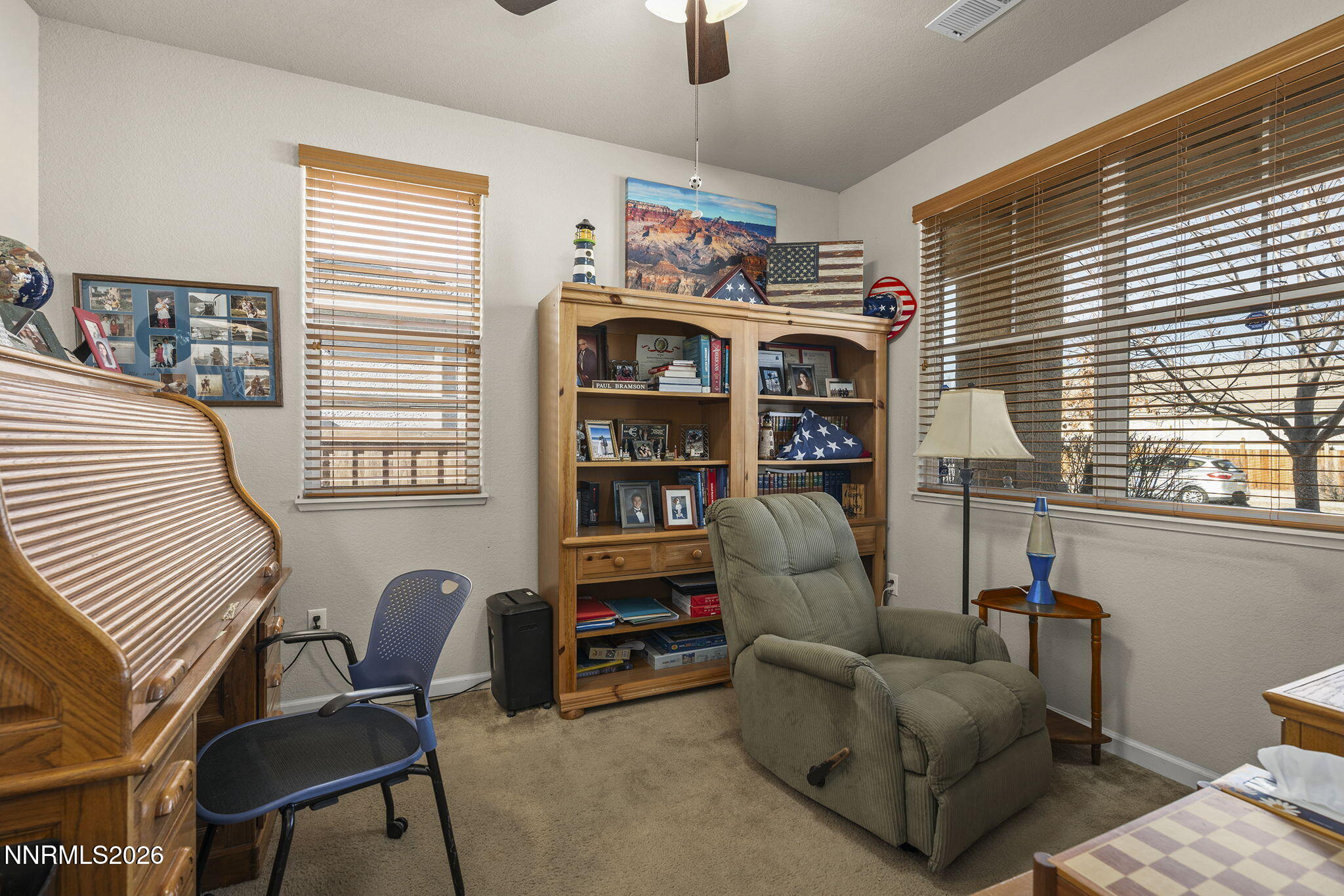 6787 Centaurus Drive Sparks, NV 89436 - Photo 11 of 39 a living room with furniture cabinets and window