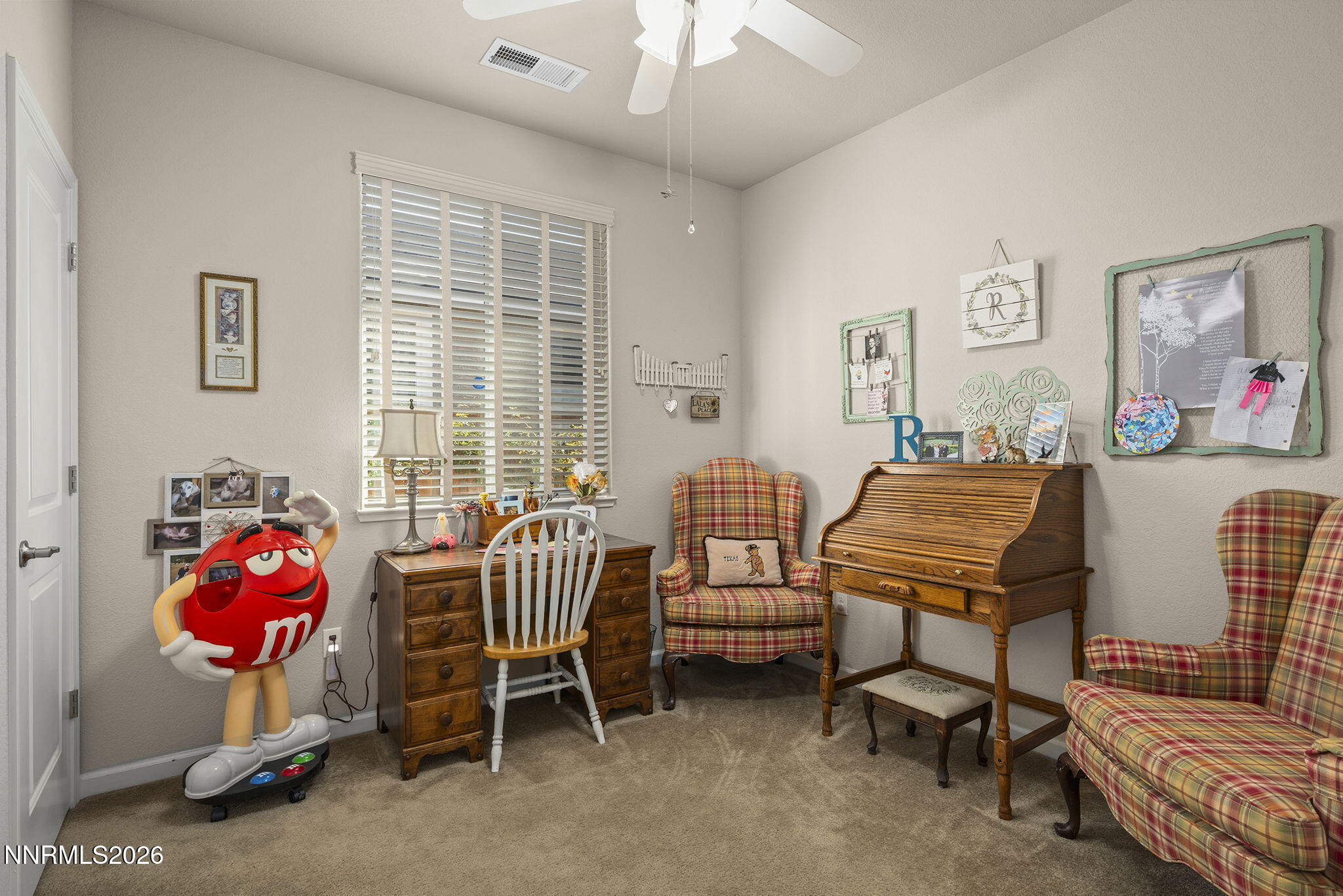 6787 Centaurus Drive Sparks, NV 89436 - Photo 16 of 39 a living room with furniture and a window