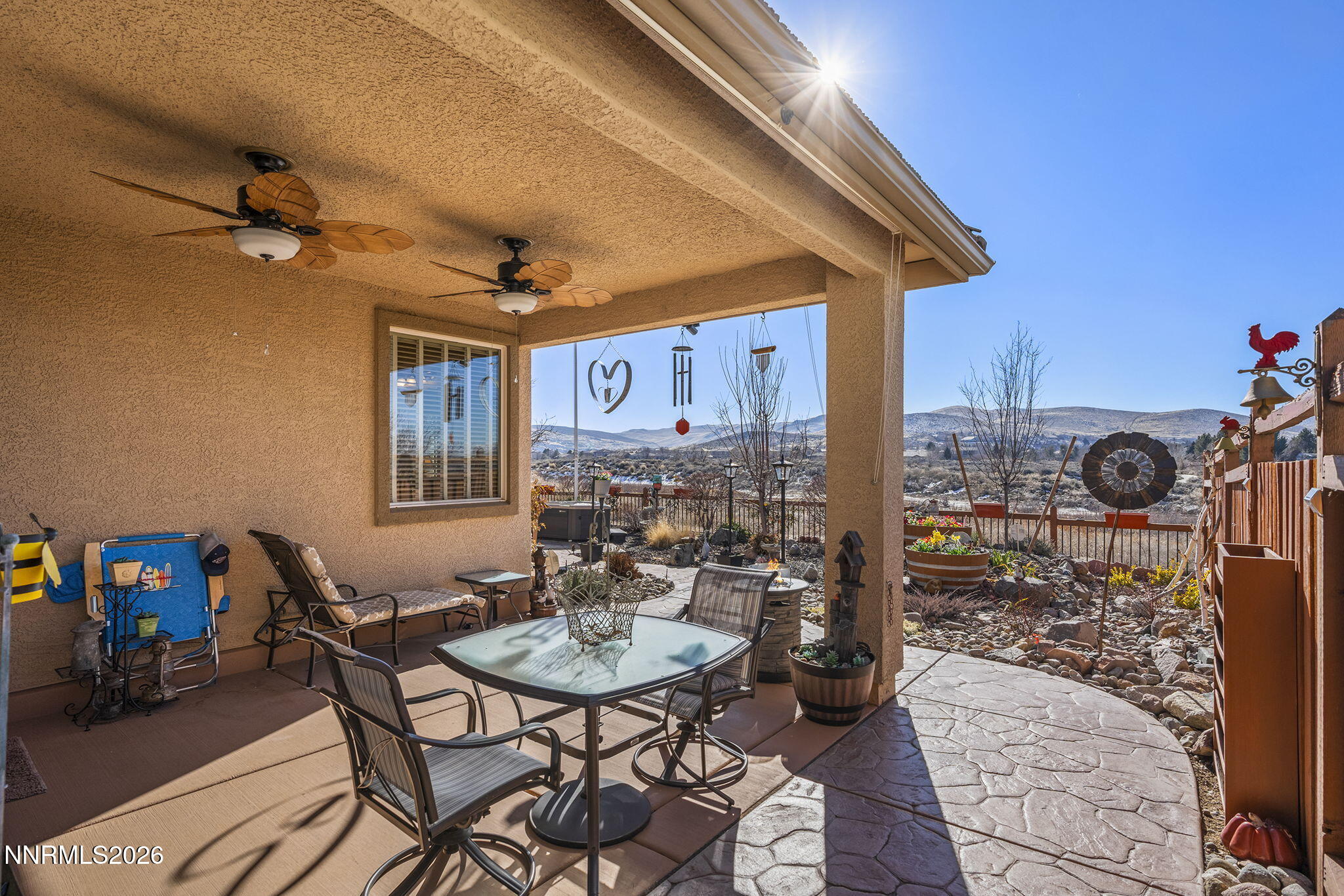 6787 Centaurus Drive Sparks, NV 89436 - Photo 20 of 39 a view of a dining room with furniture and a chandelier