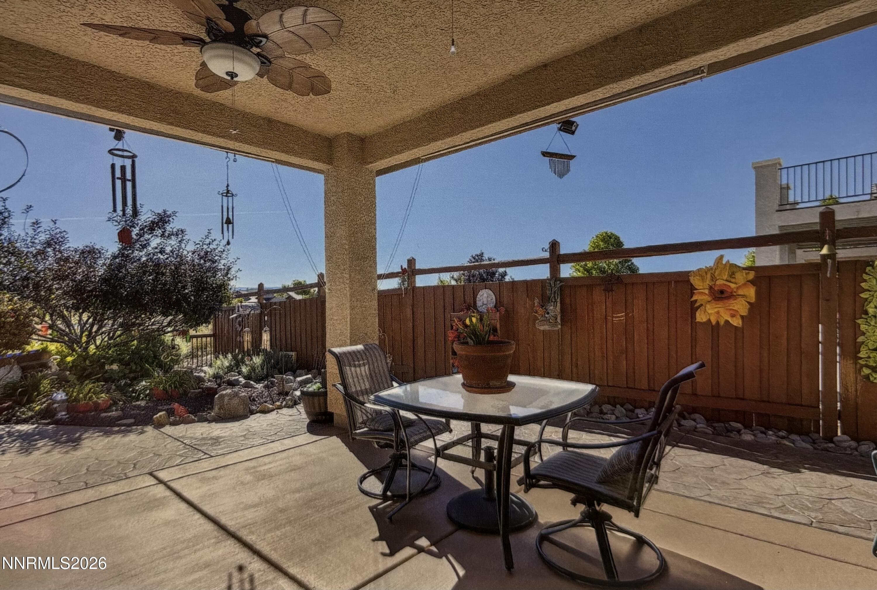 6787 Centaurus Drive Sparks, NV 89436 - Photo 24 of 39 a view of a table and chairs in patio