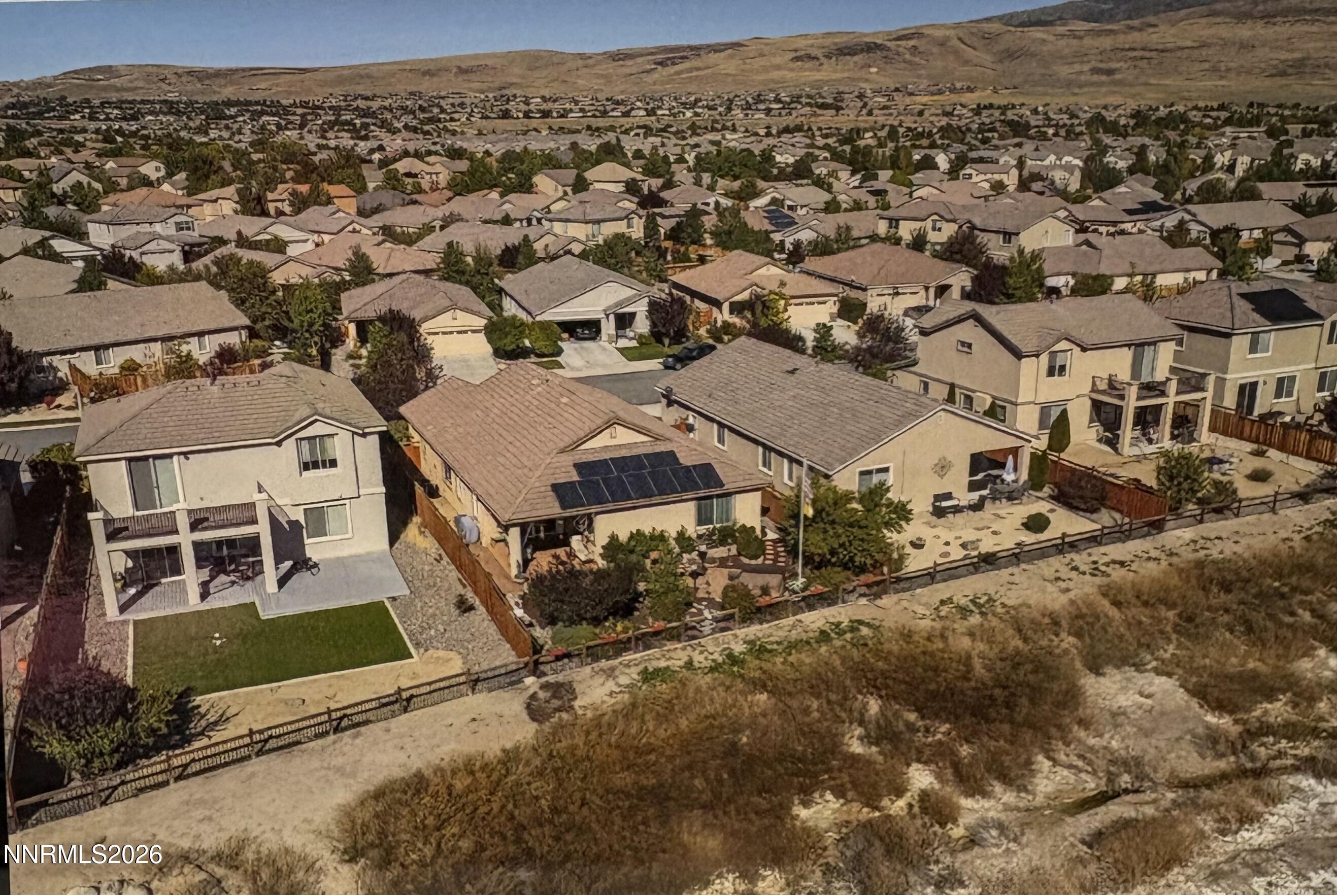 6787 Centaurus Drive Sparks, NV 89436 - Photo 25 of 39 an aerial view of residential houses with city view