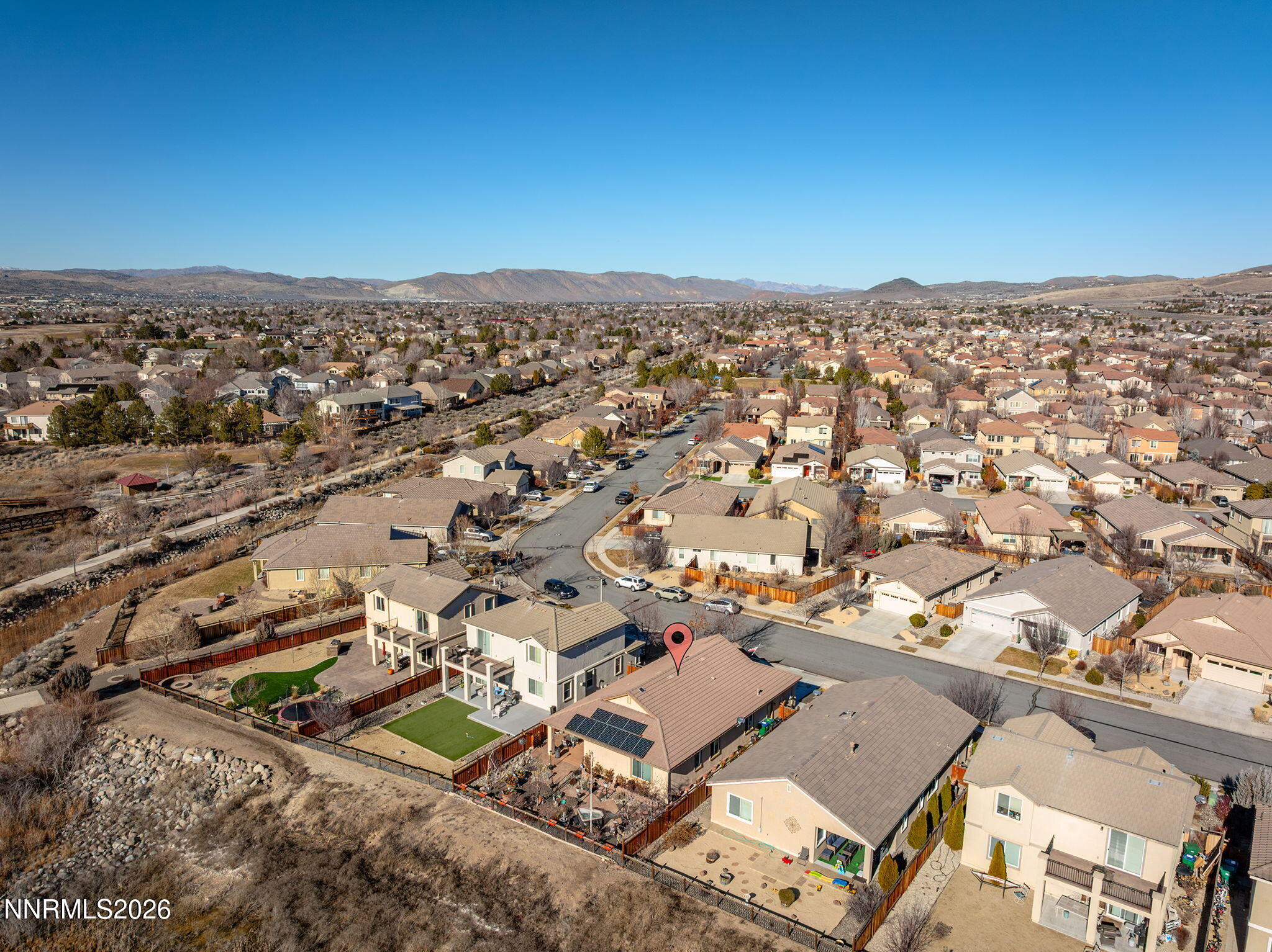 6787 Centaurus Drive Sparks, NV 89436 - Photo 35 of 39 an aerial view of a city with lots of residential buildings