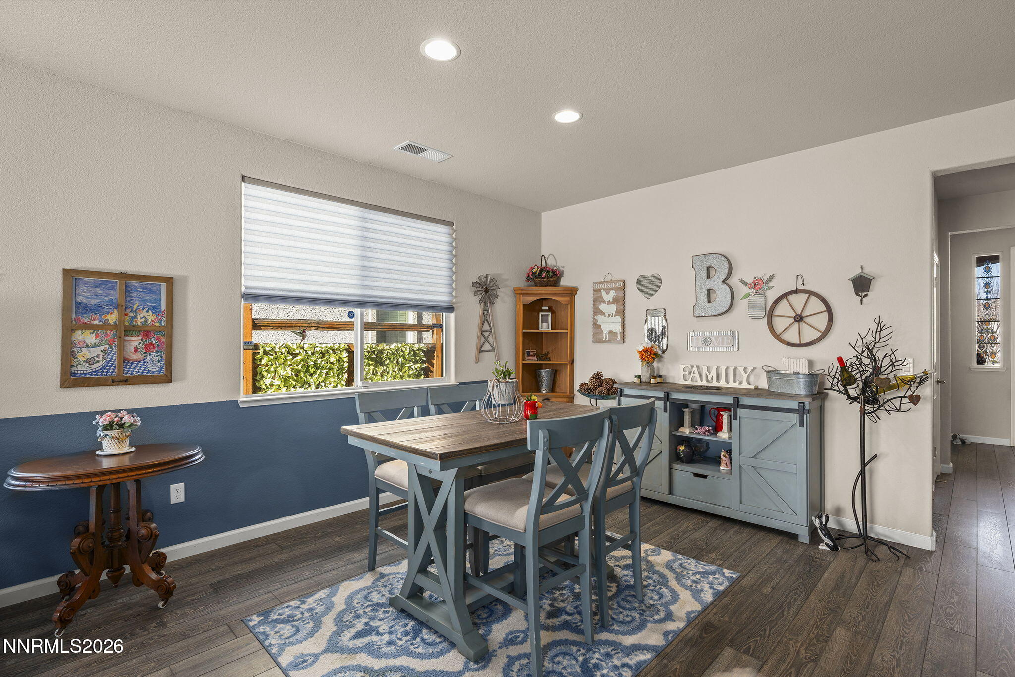 6787 Centaurus Drive Sparks, NV 89436 - Photo 4 of 39 a view of a dining room with furniture window and wooden floor