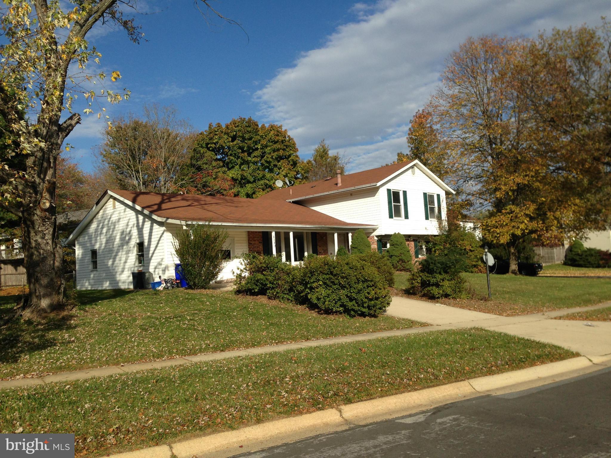 1616 Hopefield Road Silver Spring, MD 20905 - Photo 2 of 22 a front view of a house with a yard