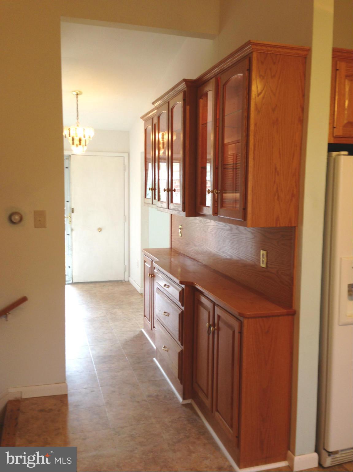 1616 Hopefield Road Silver Spring, MD 20905 - Photo 9 of 22 a kitchen with a sink and cabinets