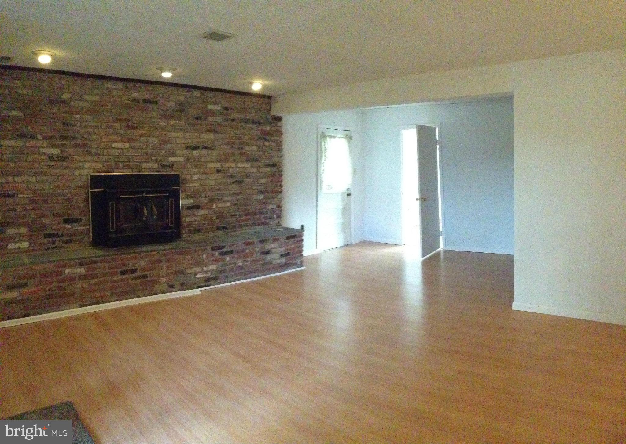 1616 Hopefield Road Silver Spring, MD 20905 - Photo 10 of 22 a view of a livingroom with wooden floor