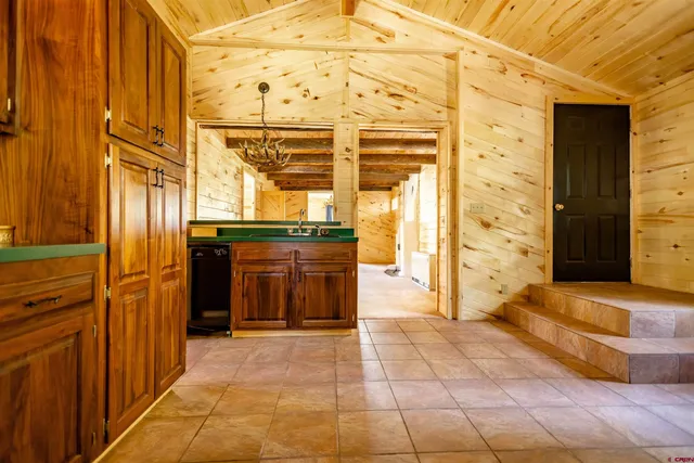 a view of an empty room with a fireplace
