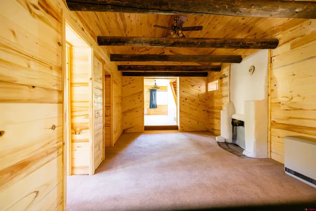 a view of a room with a large window