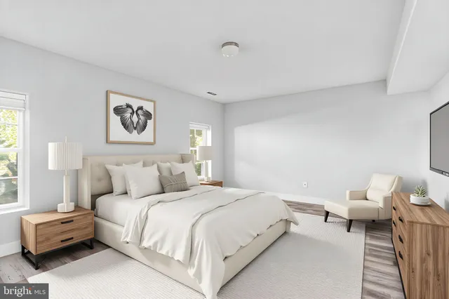 a view of an entryway with wooden floor