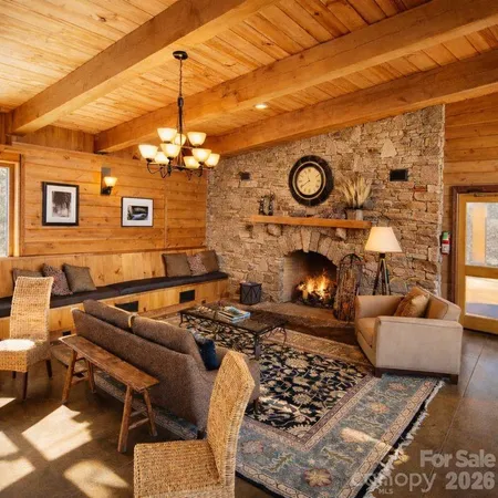 a reading room with furniture and a flat screen tv