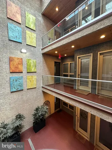 a building view with a brick wall