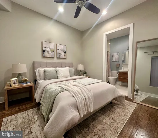 a bedroom with bed and window