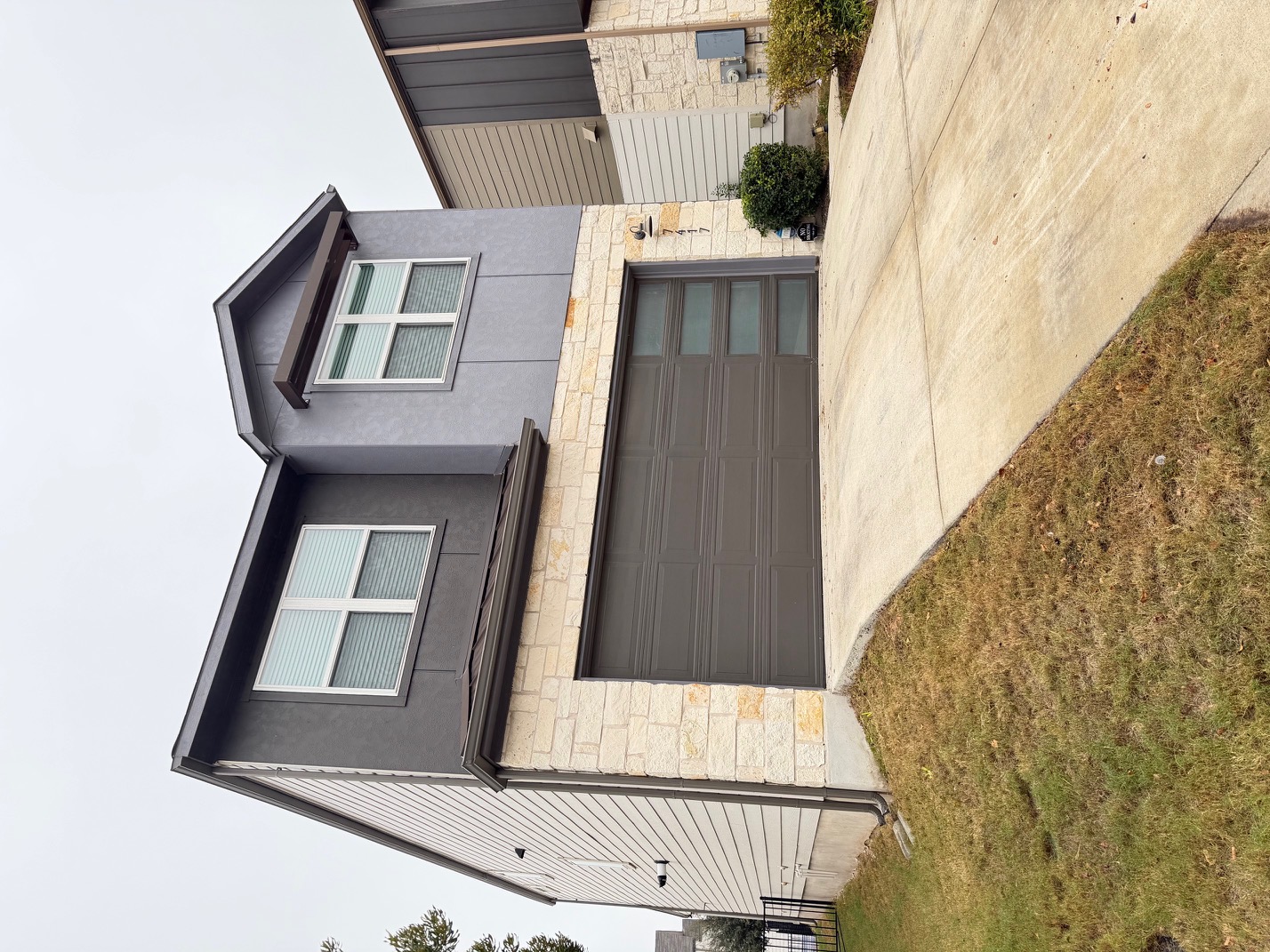 a house view with a outdoor space