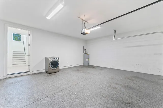 a view of entryway with stairs and wooden floor