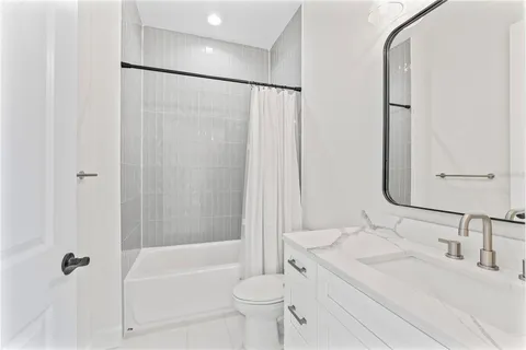 a view of a yard with flower plants