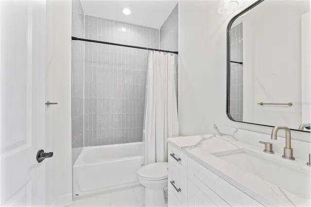 a view of a yard with flower plants