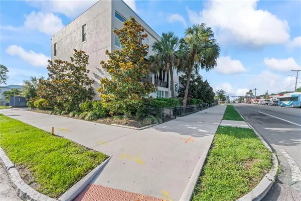 a view of a street with cars