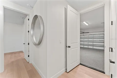 a view of a livingroom with a washer and dryer