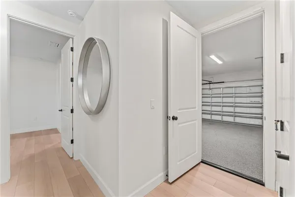 a view of a livingroom with a washer and dryer