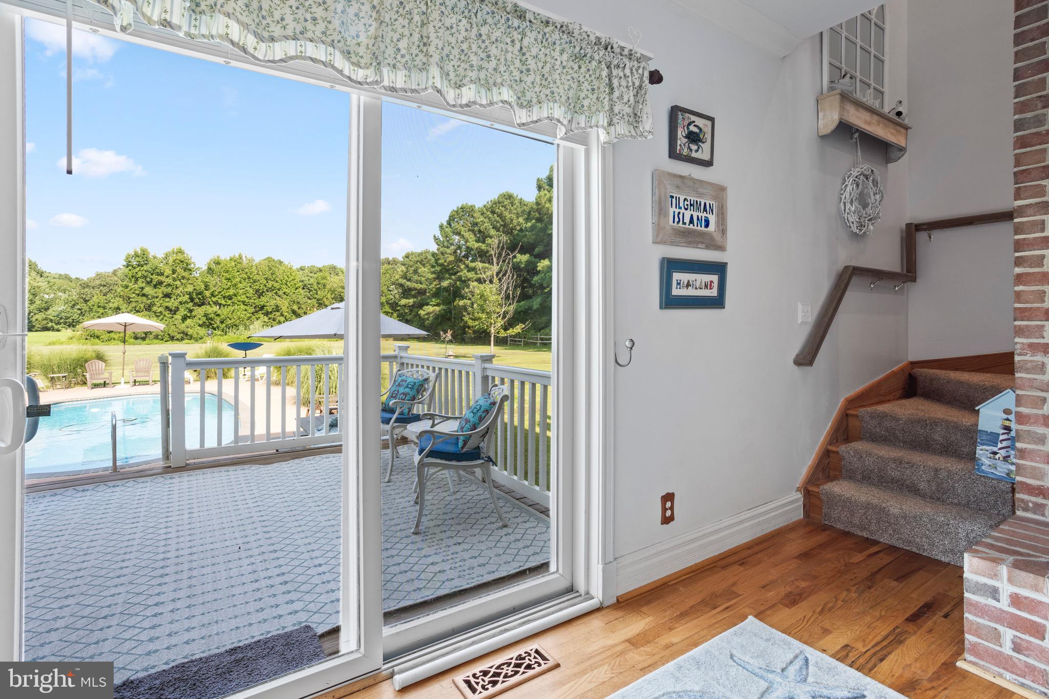 4957 Bar Neck Road Tilghman, MD 21671 - Photo 27 of 45 Family room leading to the upstairs
