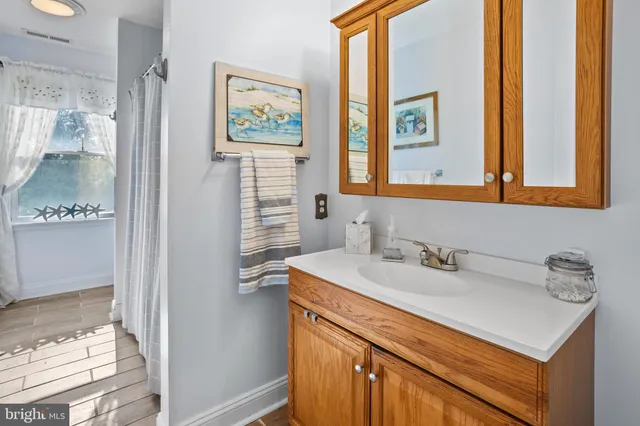 a bed room with a bed and furniture