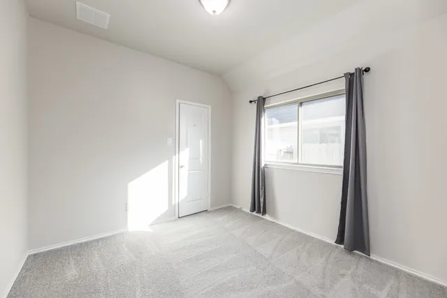 a view of empty room with window