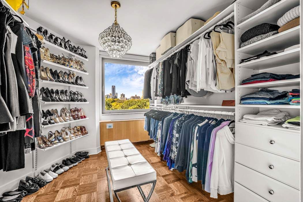 860 5th Avenue, Unit 9/10JK Manhattan, NY 10065 - Photo 10 of 19 a view of walk in closet with clothes and shoes