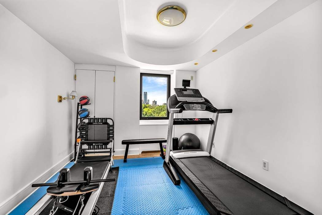 860 5th Avenue, Unit 9/10JK Manhattan, NY 10065 - Photo 15 of 19 a view of a room with gym equipment