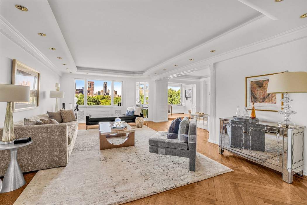 860 5th Avenue, Unit 9/10JK Manhattan, NY 10065 - Photo 3 of 19 a living room with furniture and a fireplace