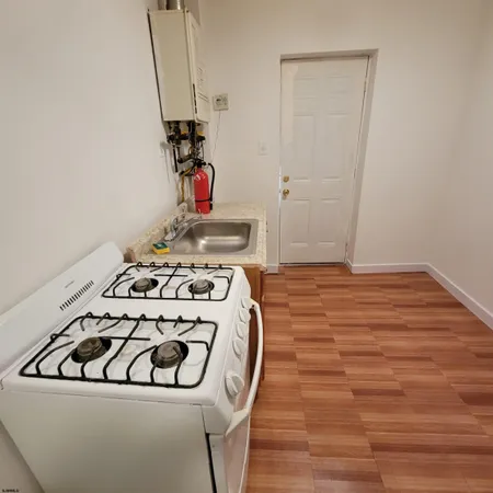 a utility room with washer and dryer