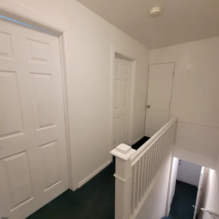 a view of a house with wooden floor