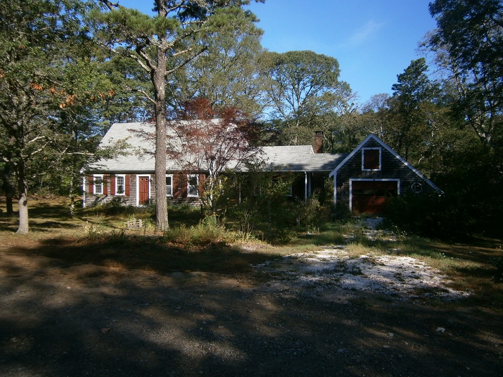 20 Dexter Street Eastham, MA 02642 - Photo 1 of 14 a front view of a house with a yard