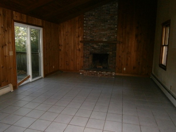 20 Dexter Street Eastham, MA 02642 - Photo 2 of 14 an empty room with windows