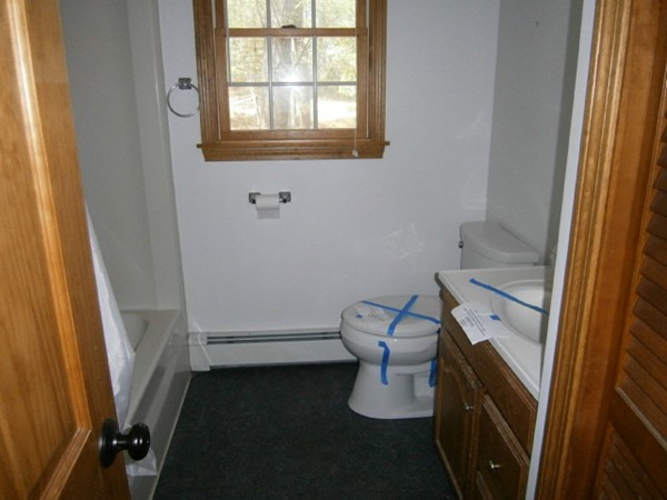 20 Dexter Street Eastham, MA 02642 - Photo 9 of 14 a bathroom with a sink and toilet