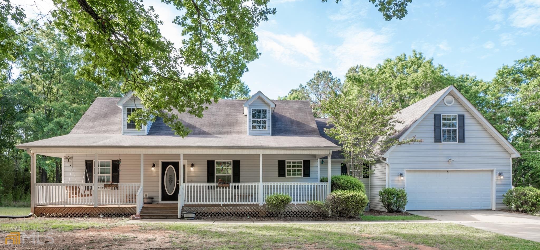 369 Johnstonville Road Barnesville, GA 30204 - Photo 1 of 1 a front view of a house with a yard