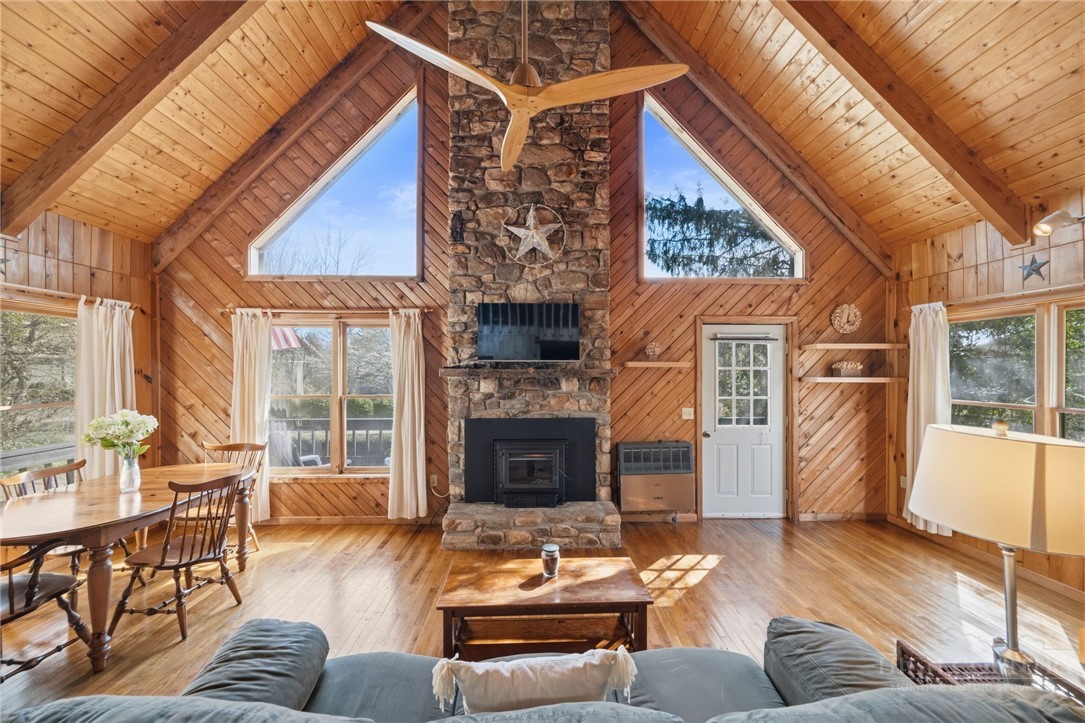 83 Pine Ridge Loop Newland, NC 28657 - Photo 2 of 32 a living room with furniture and a fireplace